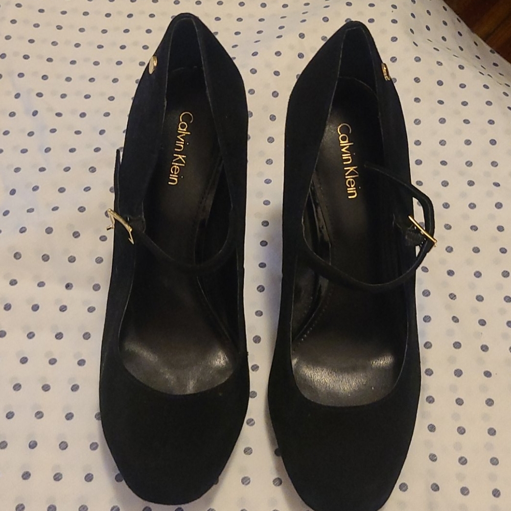 Black Calvin Klein pumps